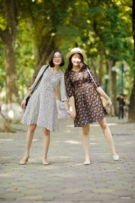 Gorgeous Asian Brunette Girls Posing In Their Summer Dresses In Public