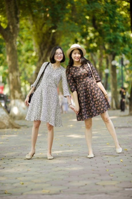 Gorgeous Asian Brunette Girls Posing In Their Summer Dresses In Public