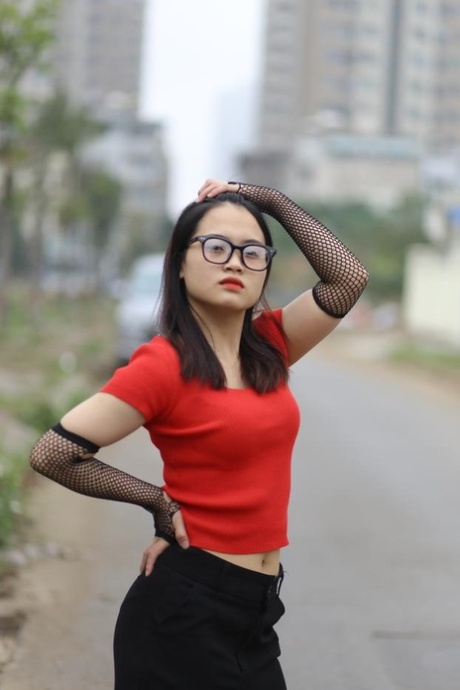 Pretty Asian Babe With Glasses Julia Myle Poses In Her Sexy Outfit In The Rain