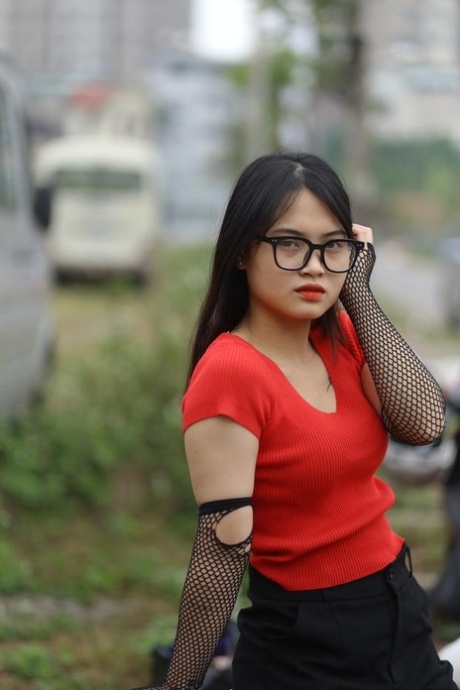 Pretty Asian Babe With Glasses Julia Myle Poses In Her Sexy Outfit In The Rain