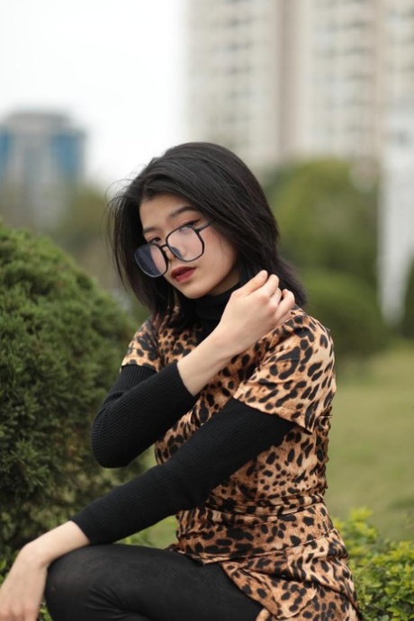 Foxy Asian Babe With Glasses Irena Posing In Her Leopard Dress In Public