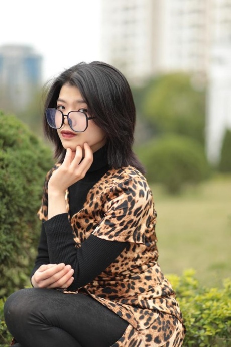 Foxy Asian Babe With Glasses Irena Posing In Her Leopard Dress In Public