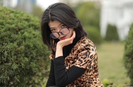 Foxy Asian Babe With Glasses Irena Posing In Her Leopard Dress In Public