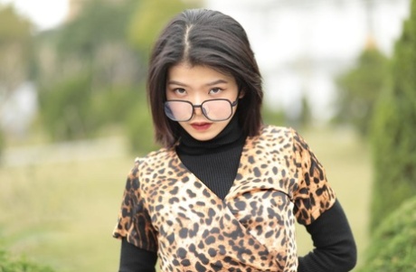 Foxy Asian Babe With Glasses Irena Posing In Her Leopard Dress In Public