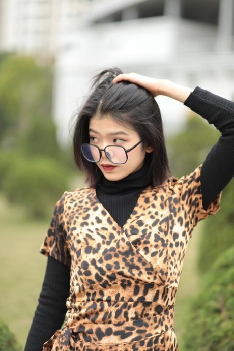 Foxy Asian Babe With Glasses Irena Posing In Her Leopard Dress In Public