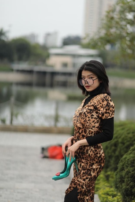 Foxy Asian Babe With Glasses Irena Posing In Her Leopard Dress In Public