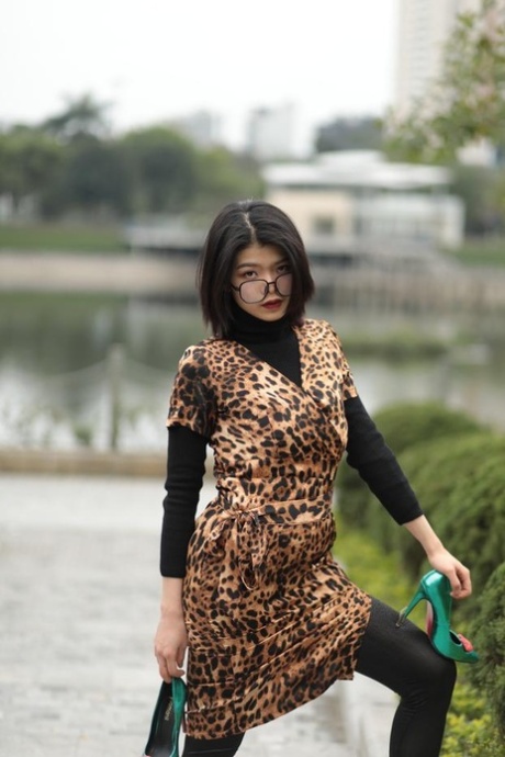 Foxy Asian Babe With Glasses Irena Posing In Her Leopard Dress In Public