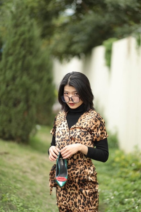 Foxy Asian Babe With Glasses Irena Posing In Her Leopard Dress In Public