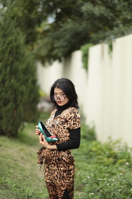 Foxy Asian Babe With Glasses Irena Posing In Her Leopard Dress In Public