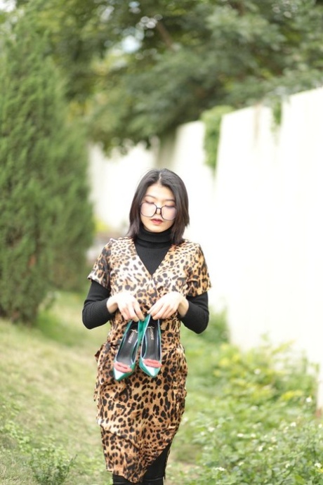 Foxy Asian Babe With Glasses Irena Posing In Her Leopard Dress In Public