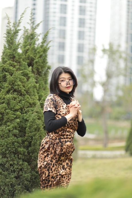 Foxy Asian Babe With Glasses Irena Posing In Her Leopard Dress In Public