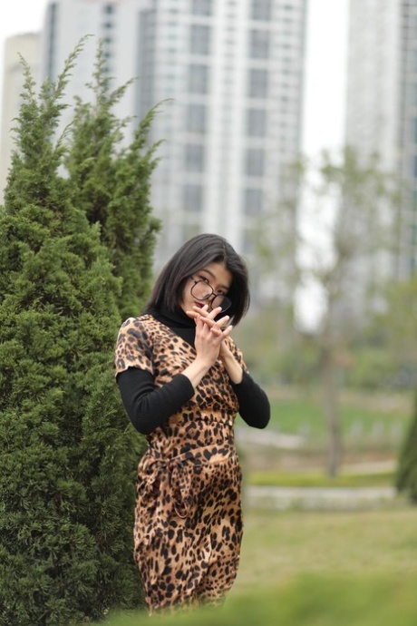 Foxy Asian Babe With Glasses Irena Posing In Her Leopard Dress In Public