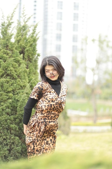 Foxy Asian Babe With Glasses Irena Posing In Her Leopard Dress In Public