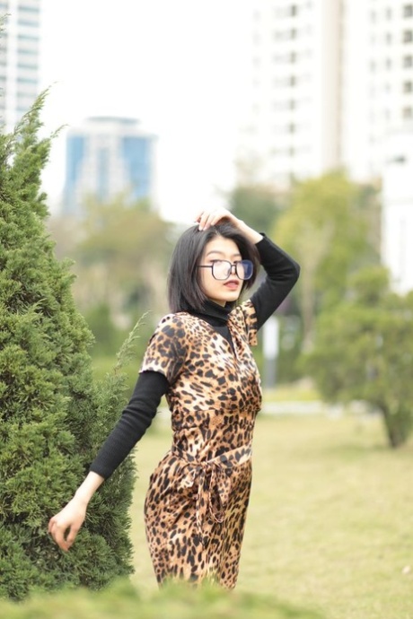 Foxy Asian Babe With Glasses Irena Posing In Her Leopard Dress In Public