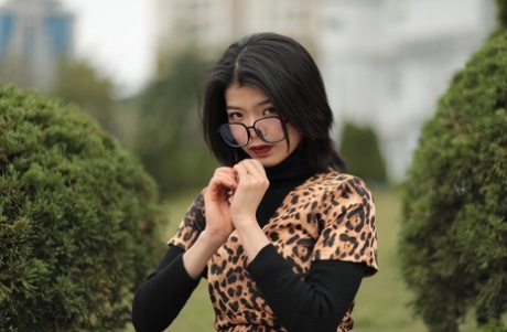 Foxy Asian Babe With Glasses Irena Posing In Her Leopard Dress In Public