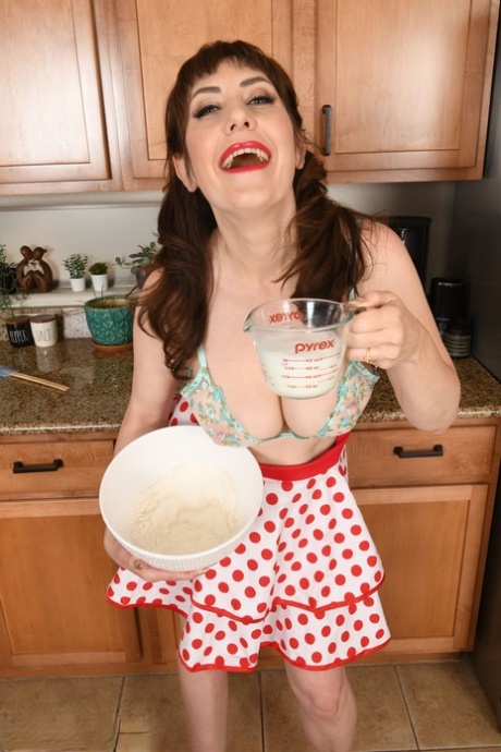 At the age of 12, Melody Mynx displays her saggy legs and spreads her hot holes while baking cookies.