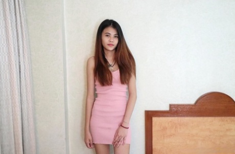 Slim Asian Teen Mai Exposes Her Slender Figure And Poses In A Hotel Room