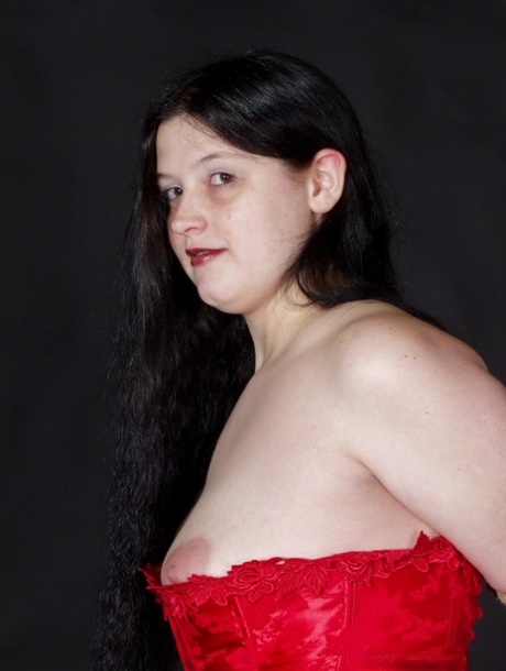 A male handler performs the act of tied-up Slavegirl Emma, who is a choosy brunette, in rope bondage.