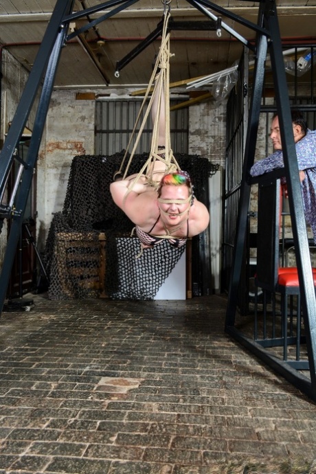 Chubby Nerdy Female Bunny Gets Tied Up And Hang On The Ceiling In Fishnets