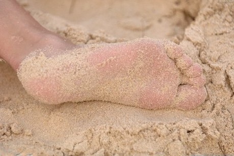 Andrea, the sexiest amateur performer, flaunting her seductive body on a Hawaiian beach.