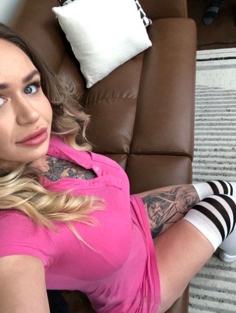 Tattooed Bombshell Baby Gold Strips Naked While Flaunting Her Big Boobs