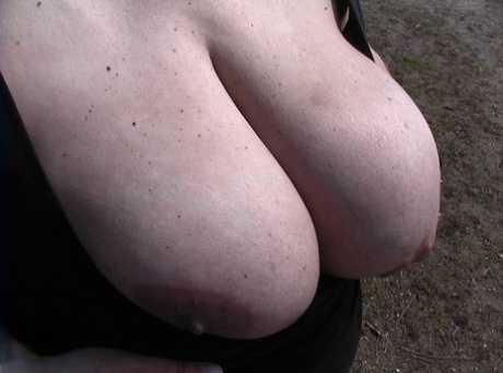 Being an adult woman with ample breasts, Nelleke showcased her full-figured figure by exposing herself to the air and playing with her vagina.