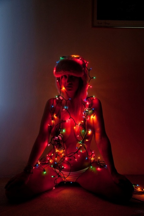 Teen girlfriend Alice Wonder grabbing her big natural tits in a Christmas solo
