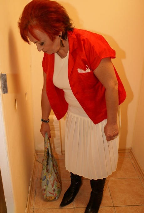 Chubby grandma Isabelle rides a BBC in a gloryhole toilet and receives facial treatments.