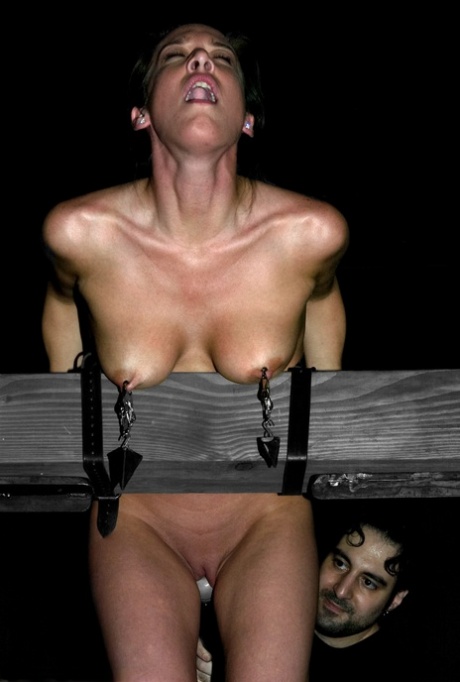 Pretty MILF Jade Marxxx Gets Toyed While Bound To A Wooden BDSM Construction