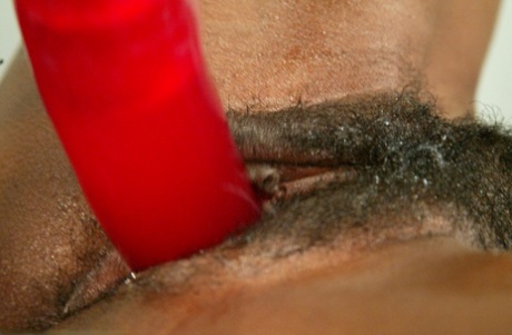 In a variety of positions, Stacey Cash from Ebony MILF takes on the role of a machine dildo.