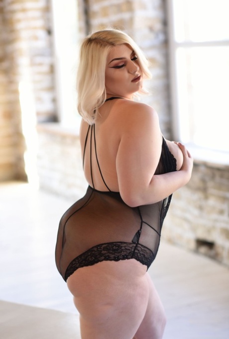 Fat British Blonde Reveals Her Huge Natural Tits While Posing In Lace Bodysuit