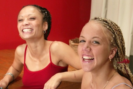 Logan and Kylie Wilde, who are both lesbian hotties, play with each other's dreadlocks during oral sex.