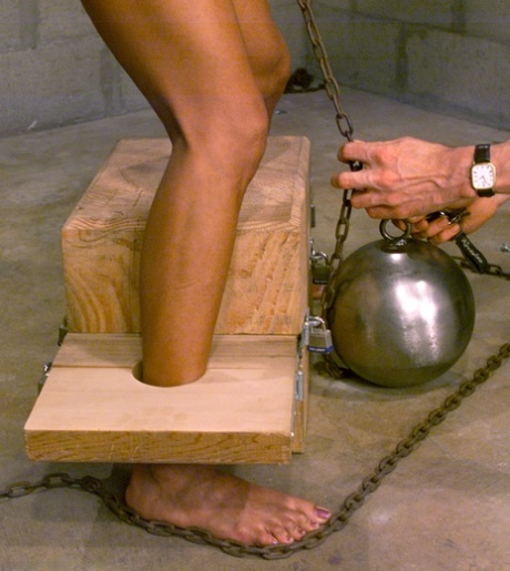 Balancing her tits with a ball and chain, Asian Kelana, who is gagged, gets the whipping she needs.