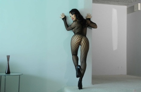 Petite Asian MILF Asa Akira Masturbates In Her Fishnet Bodystocking And Heels