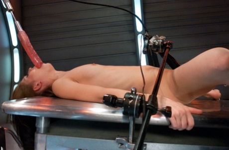 During her solo session in BDSM, Sensi Pearl, a thin brunette, is performed by an automated device.