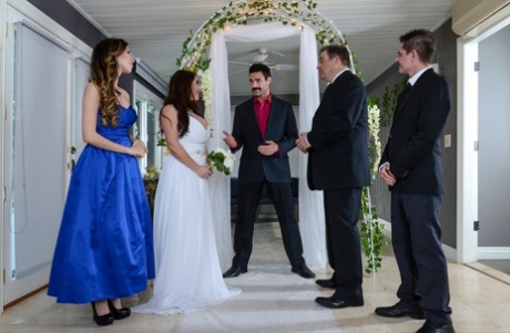 During the wedding, Angela White, the bride, is subjected to an analysis and has her big tummies shaken.