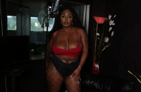 Her black pussy and breasts are the subject of Ebony Layton Benton's sexual encounter at the music studio.
