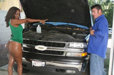 For Ebony MILF Sinnamon Love, the mechanic performs an oiling and fingernapping procedure on her booty.