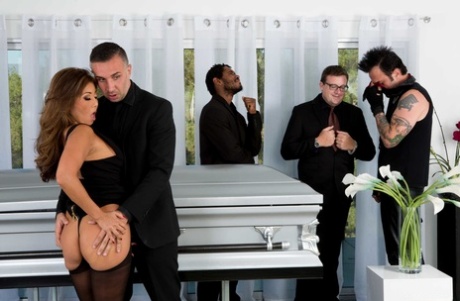 An alluring Asian MILF with big tits on Akira Lane is given head and burial in a coffin.