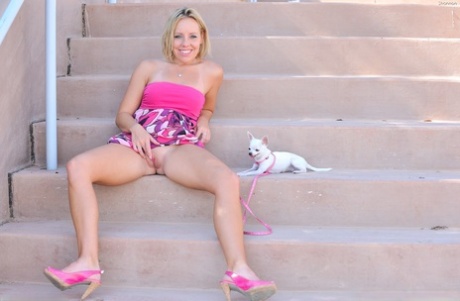 During an eventful day, Shannon, the gorgeous blonde, exposes her breast and covers it with a sensual toy.