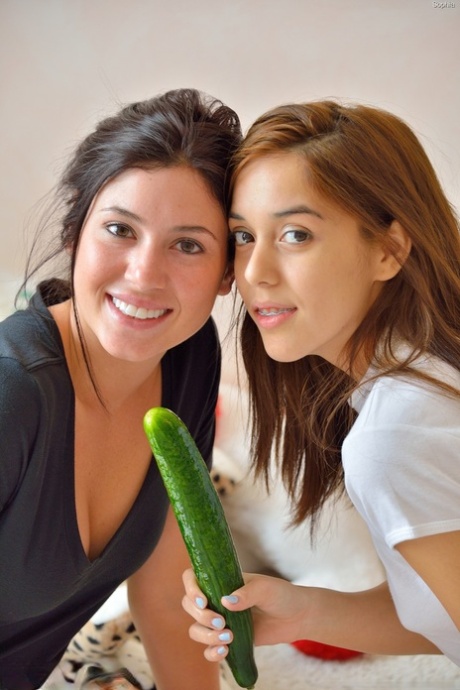 Sweet Teen Sophie And Her Girlfriend Play With A Big Green Cucumber