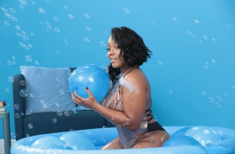 Thick Ebony Mimi Curvaceous Takes A White Dick From Behind In A Wading Pool